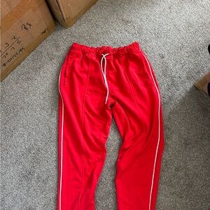 Red Track Pants with White Stripes